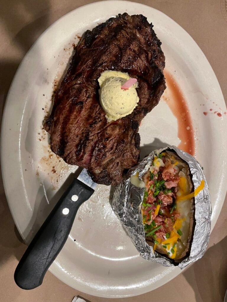 Steak and loaded baked potato at Big Mike's Steakhouse Andalusia